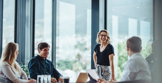 Business people having casual discussion during meeting