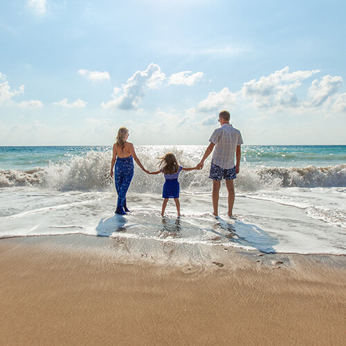 Glückliche Familie am Strand