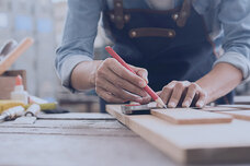 Man draws on a board